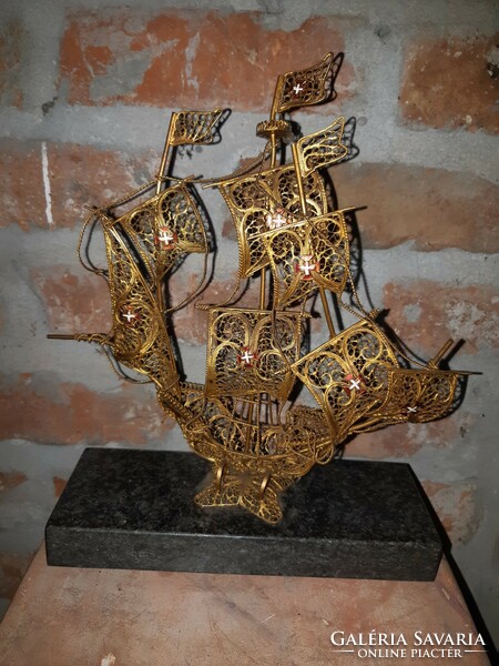 Vintage gold tone metal filigree sailboat