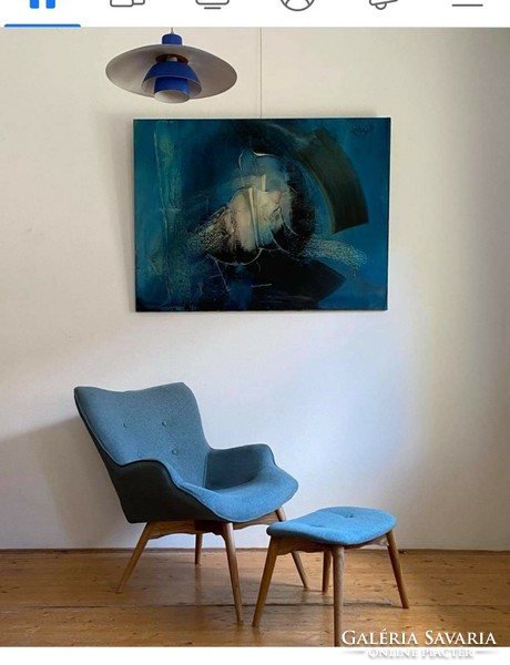 Turquoise armchair with footrest