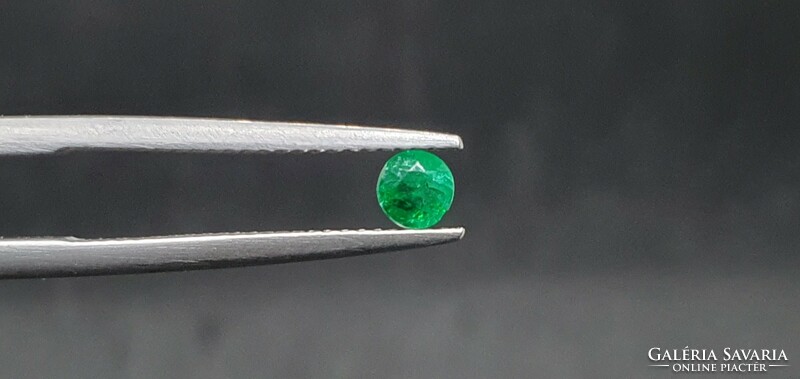 Brazilian emerald round 0.26 Carat. With certification.