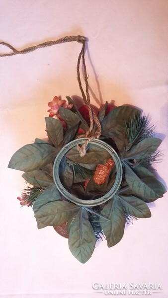 An old hanging Advent wreath made of natural materials