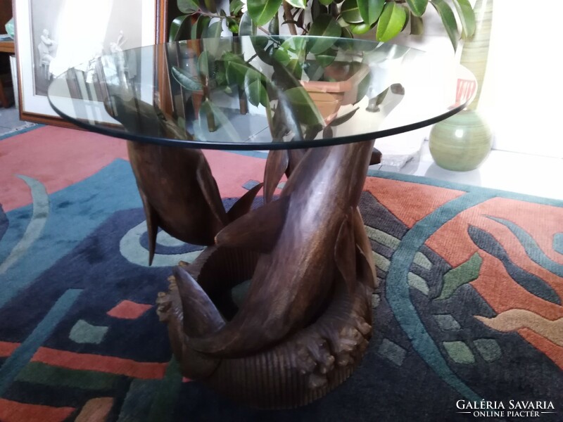 A special coffee table in the shape of a dolphin
