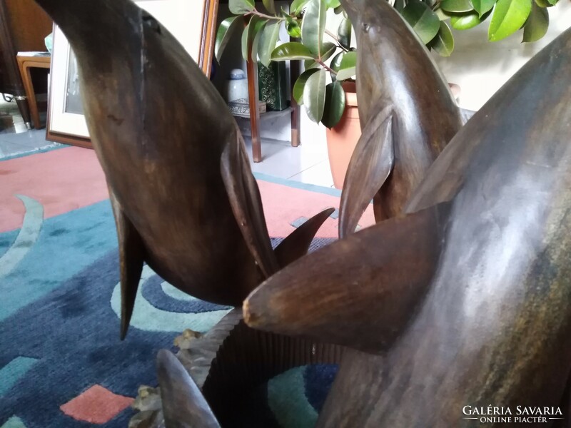 A special coffee table in the shape of a dolphin