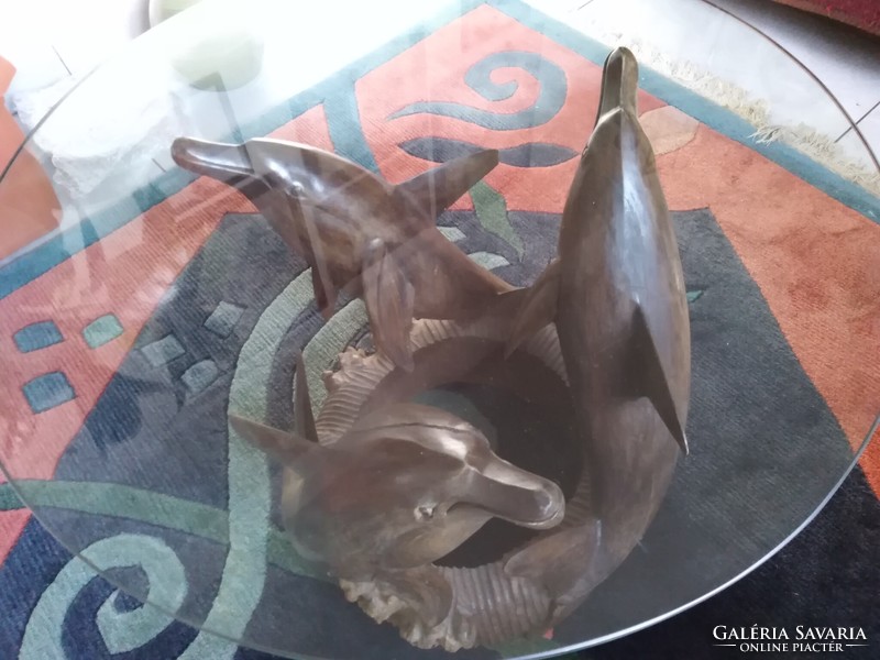 A special coffee table in the shape of a dolphin