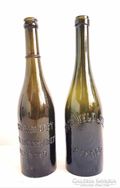 2 old beer bottles