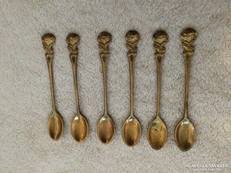 Copper spoons in one