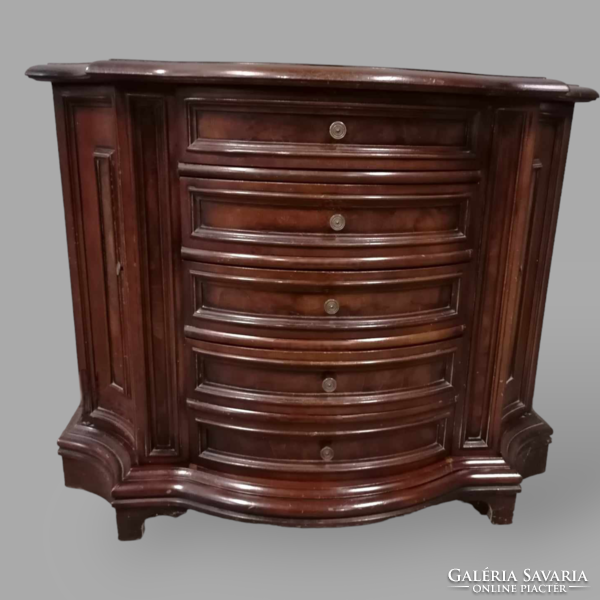 Curved chest of drawers with root veneer