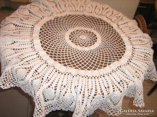 Beautiful antique handmade crocheted wavy round tablecloth