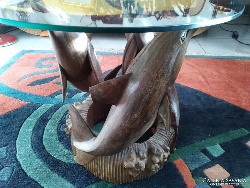 A special coffee table in the shape of a dolphin