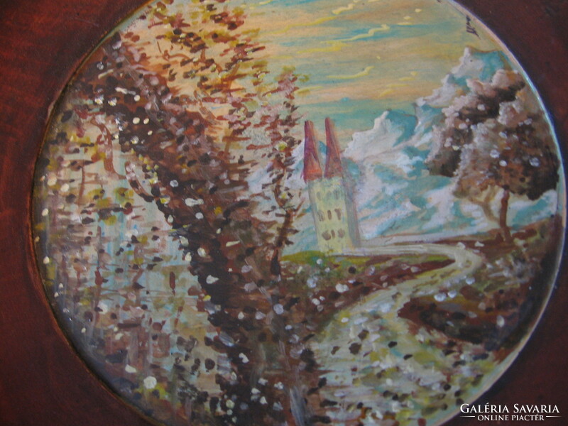 Painted snowy landscape on a wooden plate