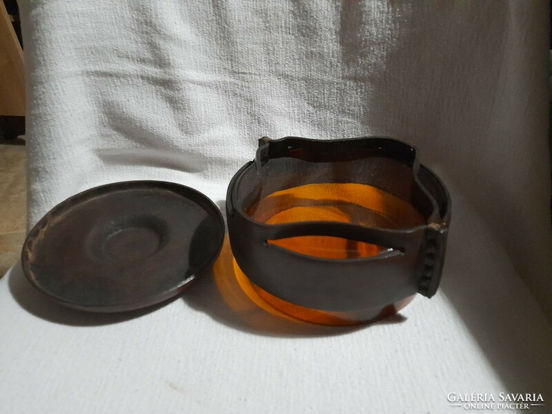 Orange colored glass and leather container, unused