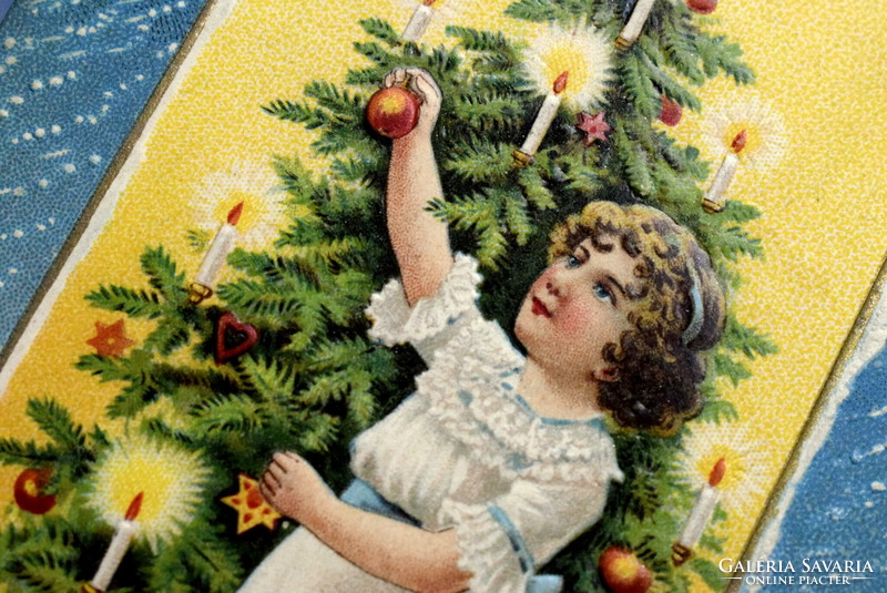 Antique embossed Christmas greeting card - little girl decorating a Christmas tree from 1907