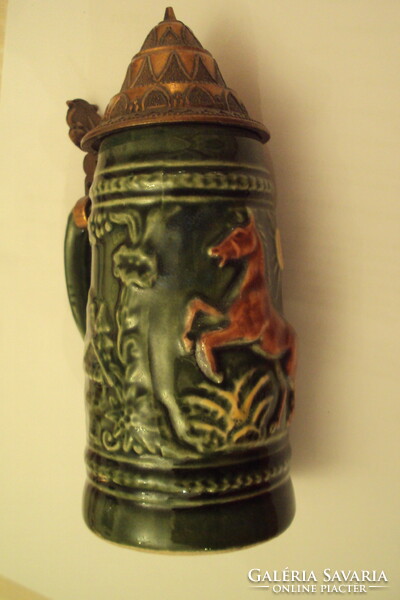 German, green-glazed, plastic-surfaced ceramic beer mug with an openable patterned red copper lid.