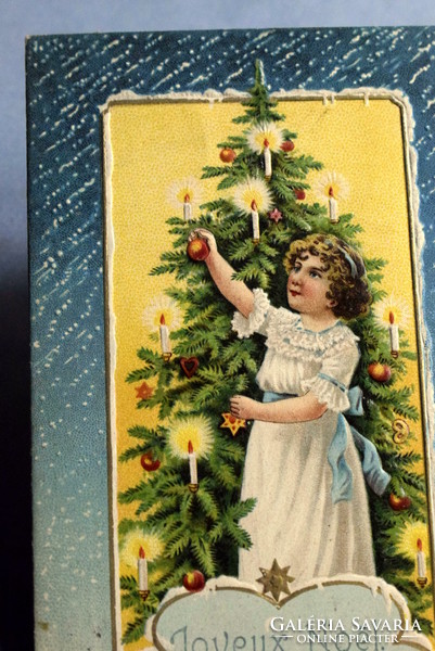 Antique embossed Christmas greeting card - little girl decorating a Christmas tree from 1907