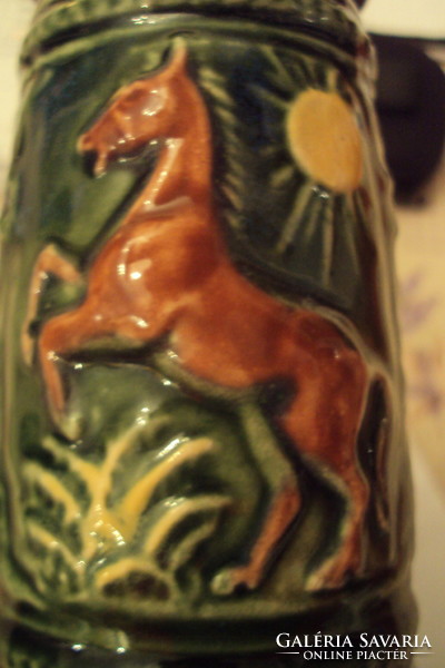 German, green-glazed, plastic-surfaced ceramic beer mug with an openable patterned red copper lid.