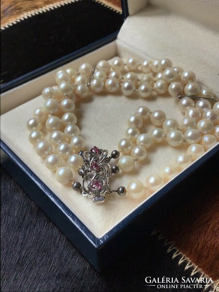 Old three-row genuine pearl bracelet with silver clasp and ruby stones