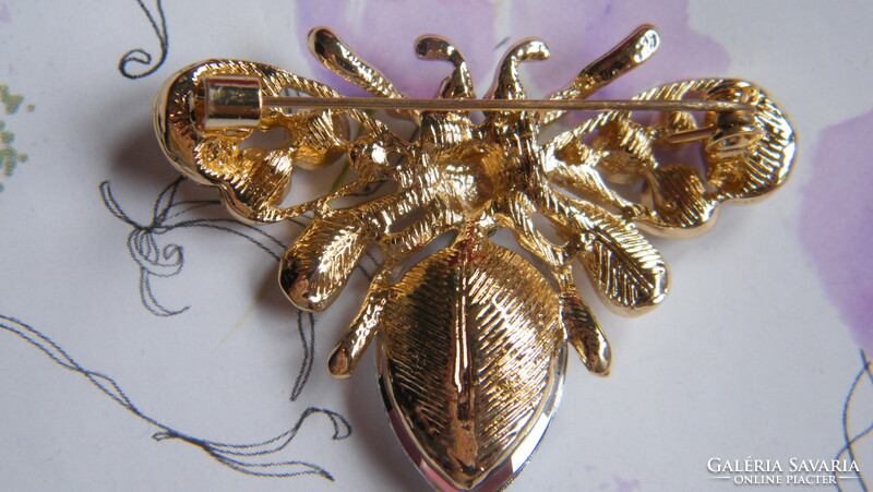 Gold-plated insect brooch with rhinestones