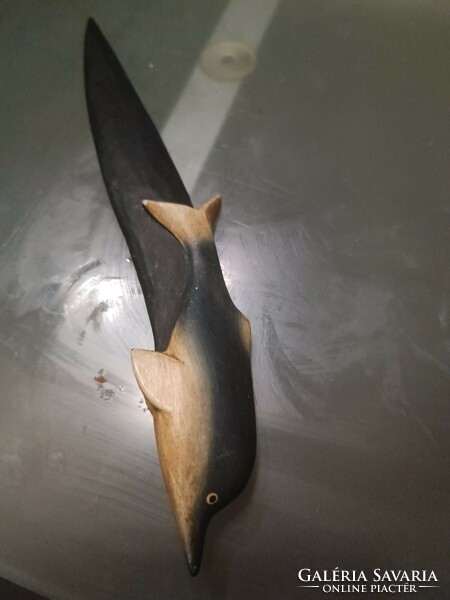 Wooden dolphin leaf opening