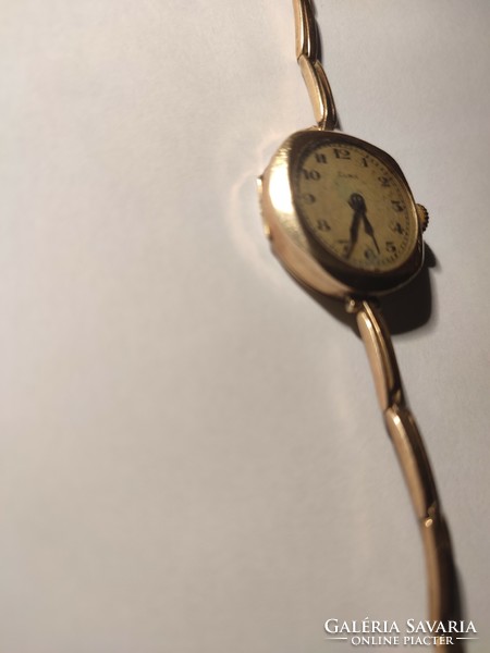 Women's gold cocktail watch