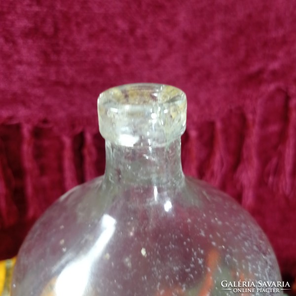 Old one-liter soda bottle, dropper