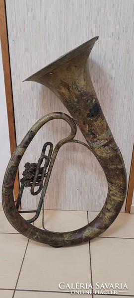 Huge antique tuba for decoration.