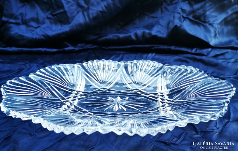 Oval glass bowl with cookies and fruit. A polished, elegant piece