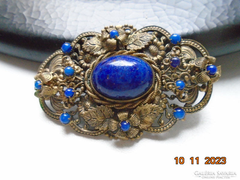 Antique gold-plated filigree spectacular brooch with polished lapis lazuli stones