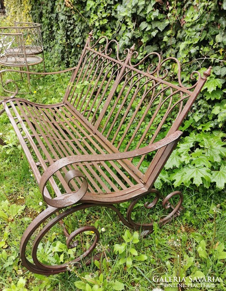 Wrought iron garden swing bench