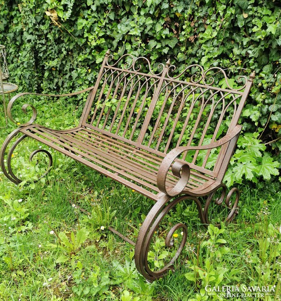 Wrought iron garden swing bench