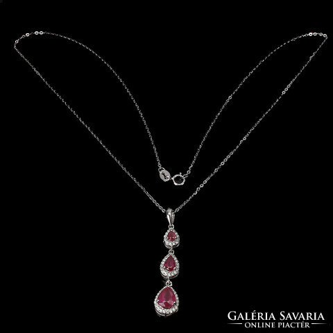 Silver ruby pendant with small zircon stones