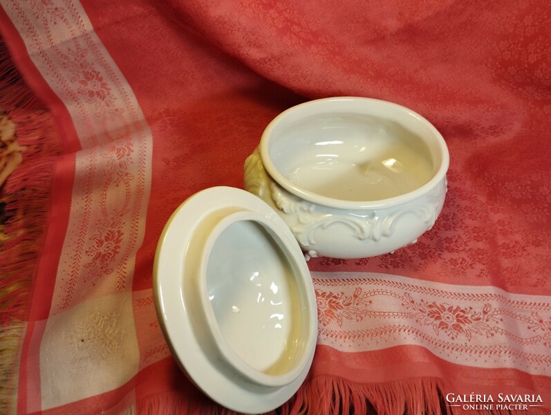 Snow-white porcelain bonbonier, jewelry holder with a hand-shaped rose