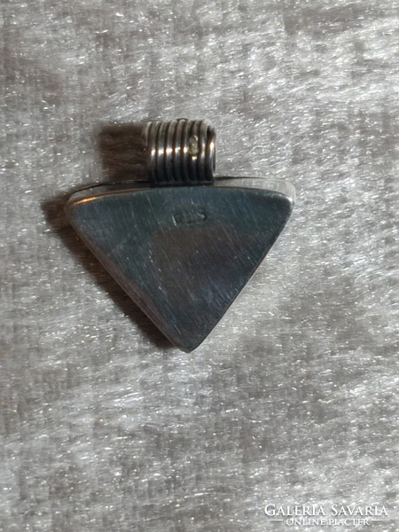 A very graceful silver small pendant from Peru