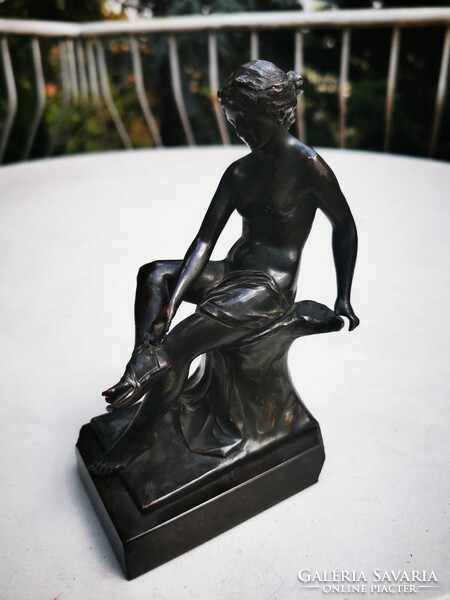 Antique bronze seated nude