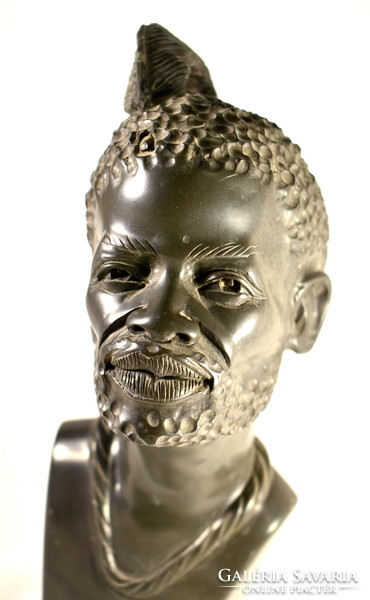 South African sculptor : with native feather decoration ... Stone sculpture with specific gravity - bust