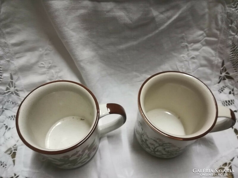 Pair of thick-walled porcelain tea mugs with filter