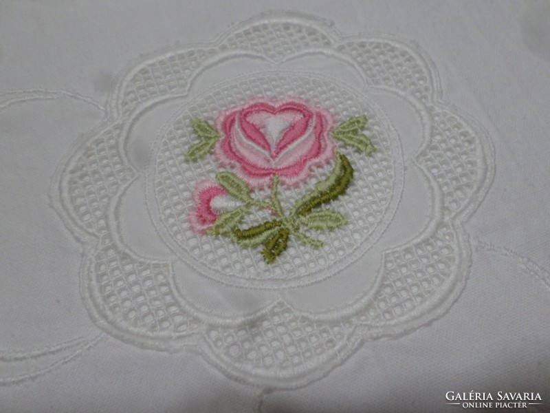 Embroidered, floral, monogrammed pillowcase.