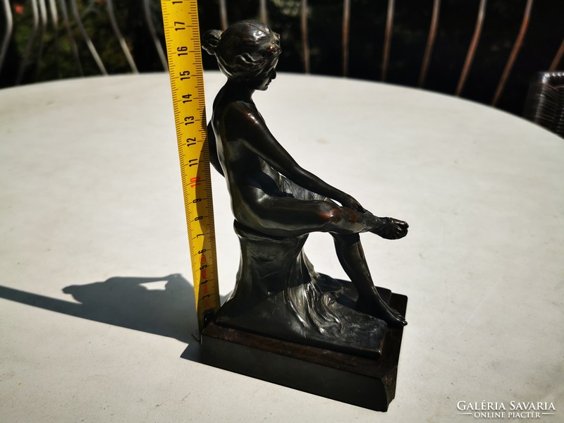 Antique bronze seated nude