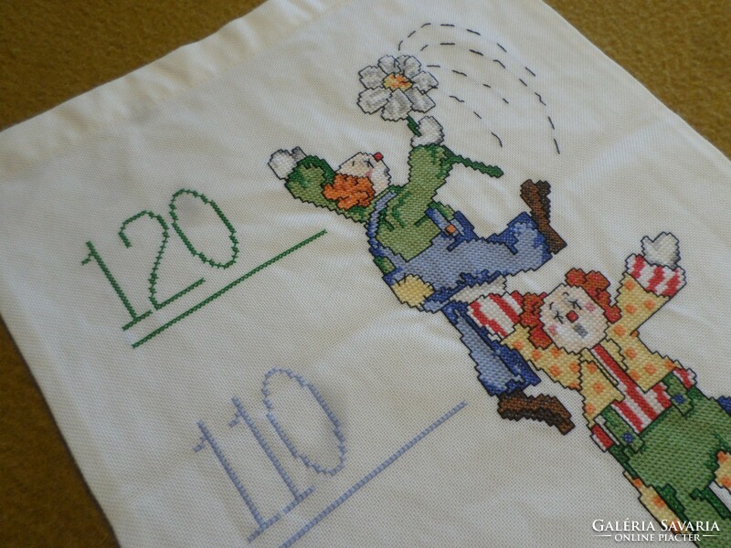 Height gauge embroidered with a fairy cross stitch.