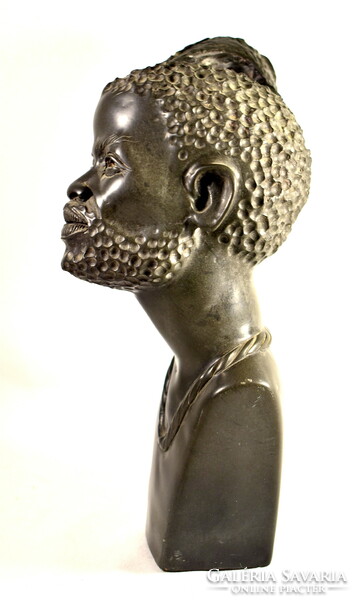 South African sculptor : with native feather decoration ... Stone sculpture with specific gravity - bust