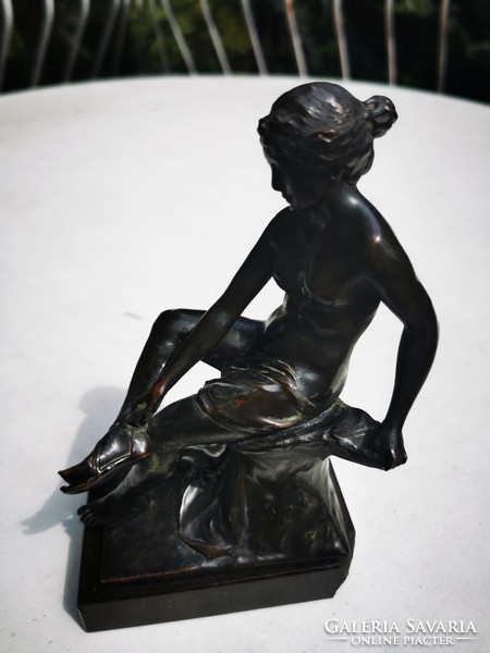 Antique bronze seated nude