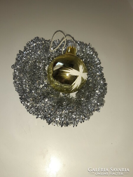 Old glass sphere Christmas tree ornament with snowy pattern