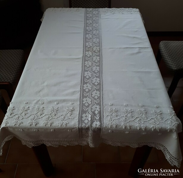 Transylvanian embossed tablecloth with crocheted lace insert and border