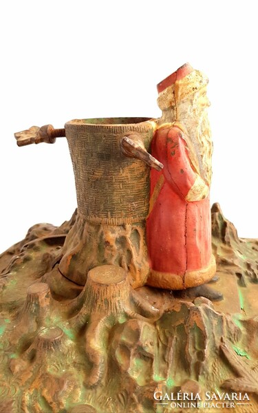 Antique 1919s cast iron Christmas tree base with Santa putt!