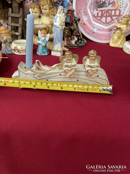 Beautiful candle holder with angels angel