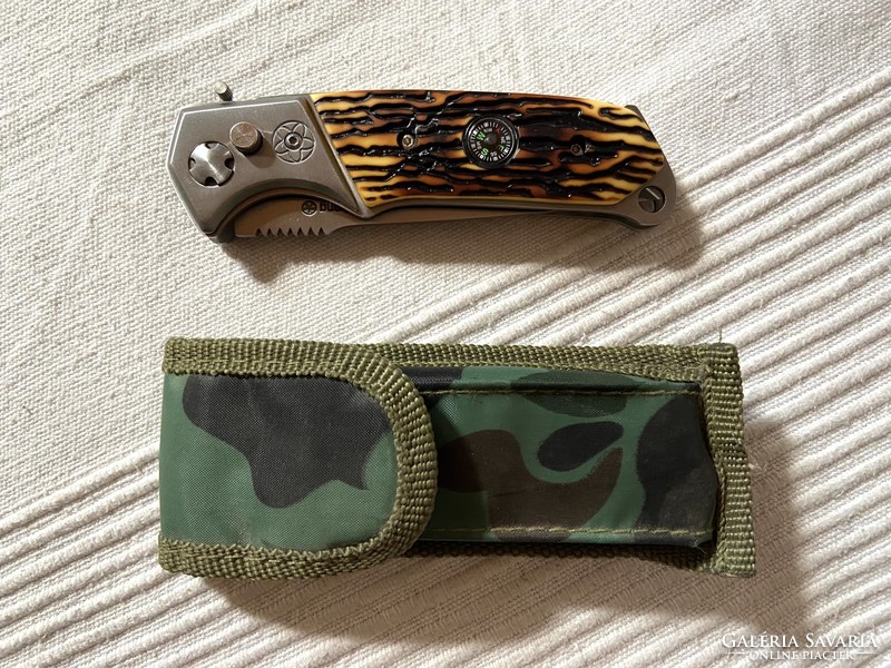 Spring-loaded knife with built-in compass + field pattern case