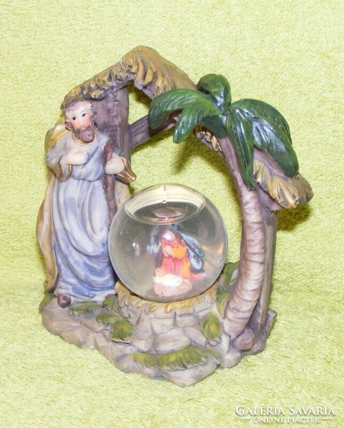 Holy family with snow globe