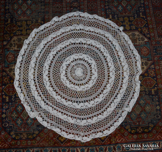 Old round lace tablecloth