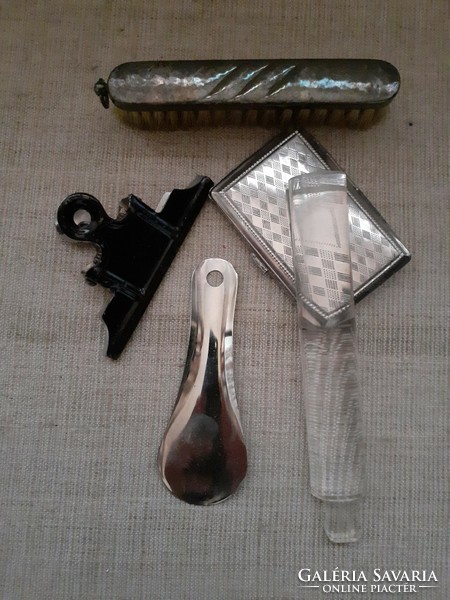 An old metal tinned shoe spoon, a paper clip and a decorative clothes brush in usable condition