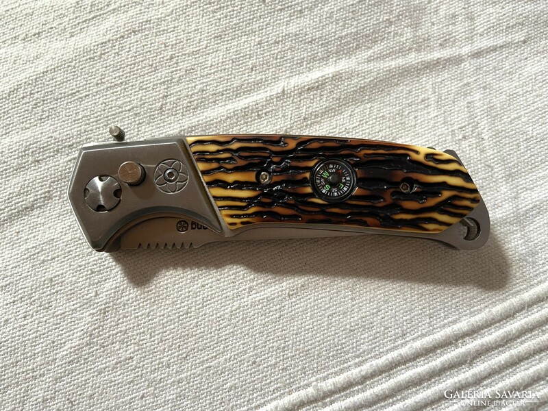 Spring-loaded knife with built-in compass + field pattern case