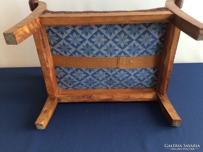 Beautiful small footstool covered with tapestry