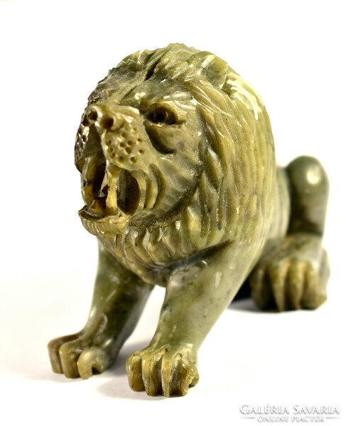 Lion ... Carved serpentine - statue made of snake stone!